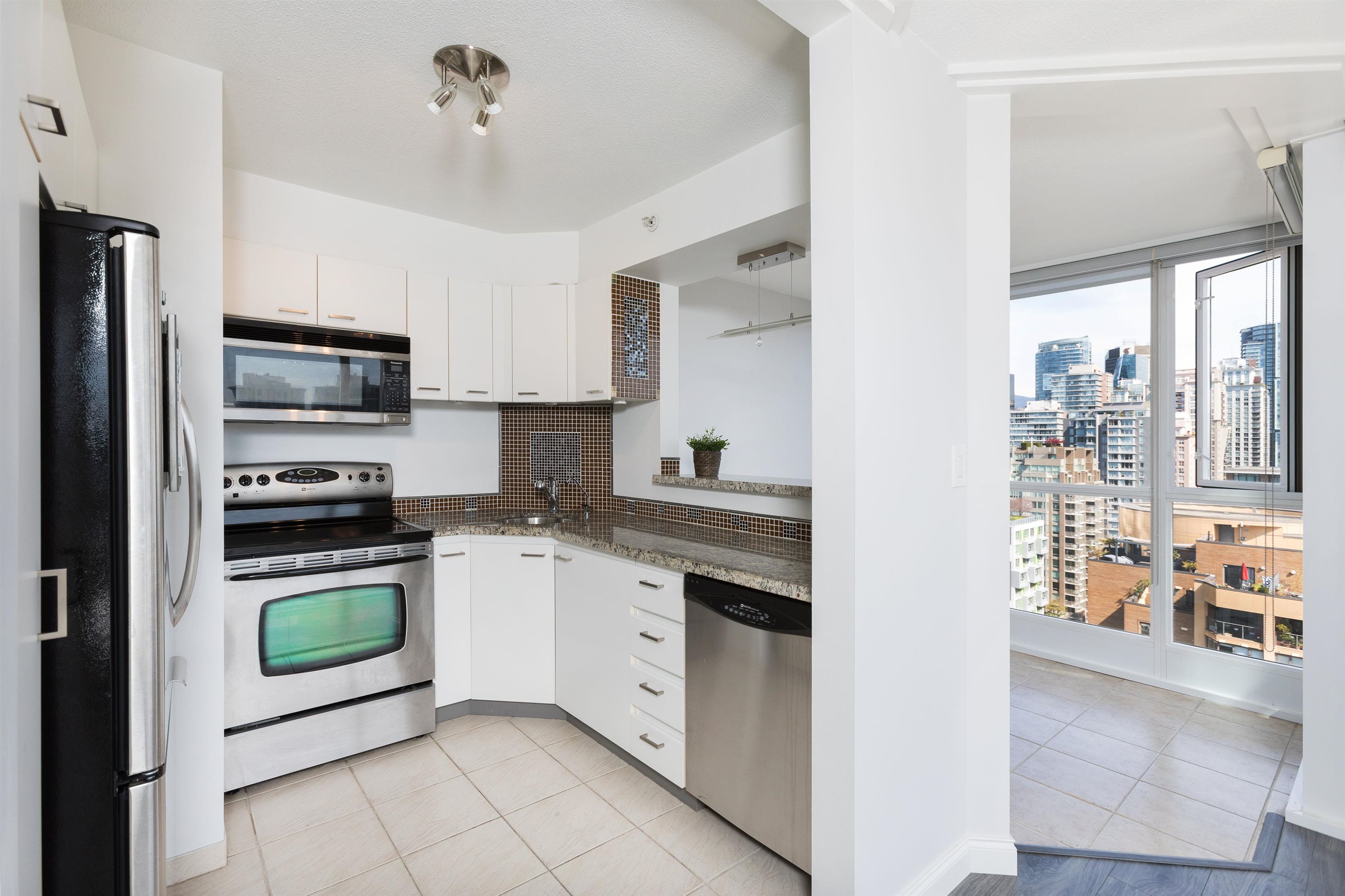 nice and bright kitchen with lots of storage