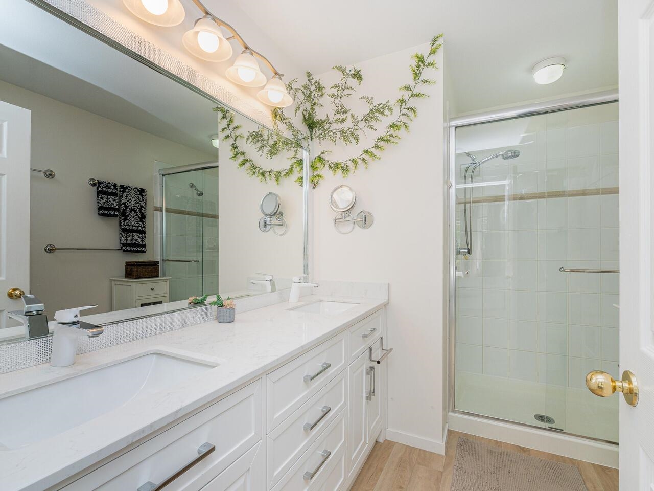 Primary ensuite has dual sinks and walk-in shower