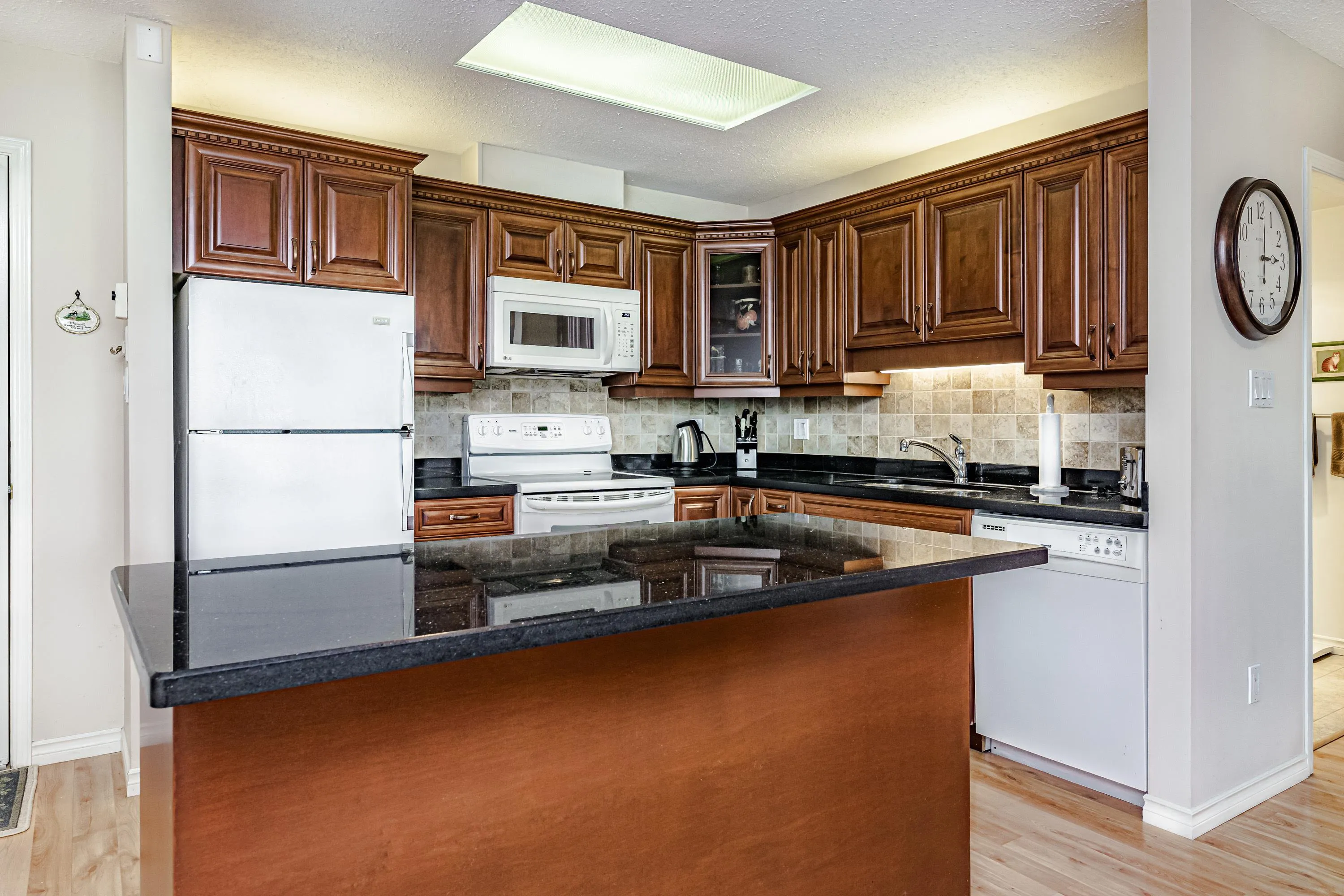 Huge updated kitchen with granite counters and island!