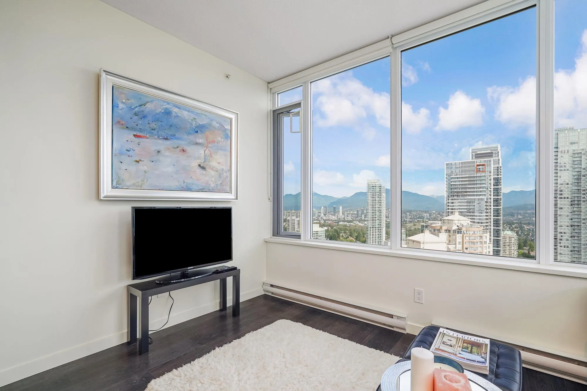 Living Room with mountain, city and water views.