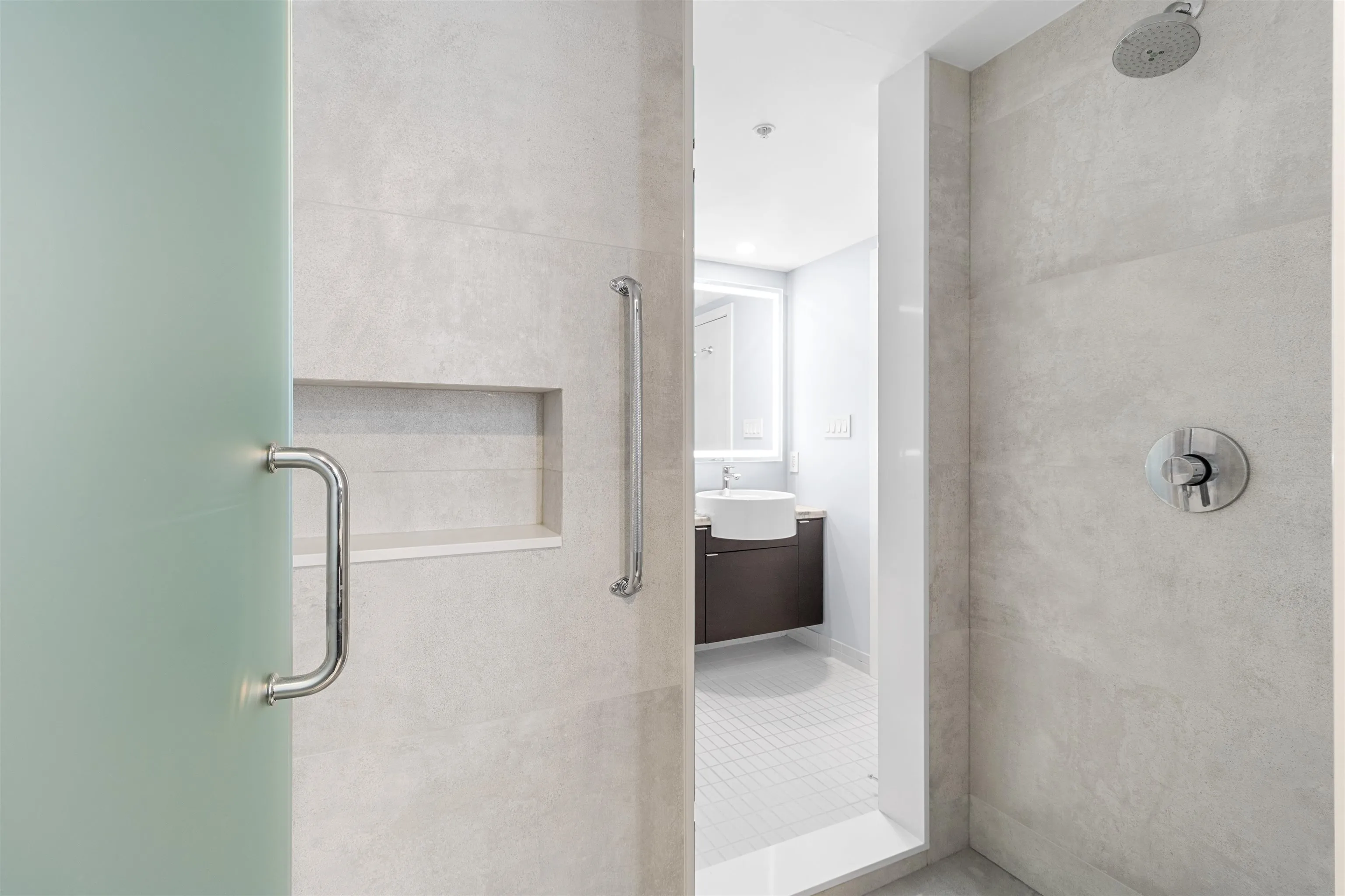 Extra large shower is accessible from ensuite and the main bath.