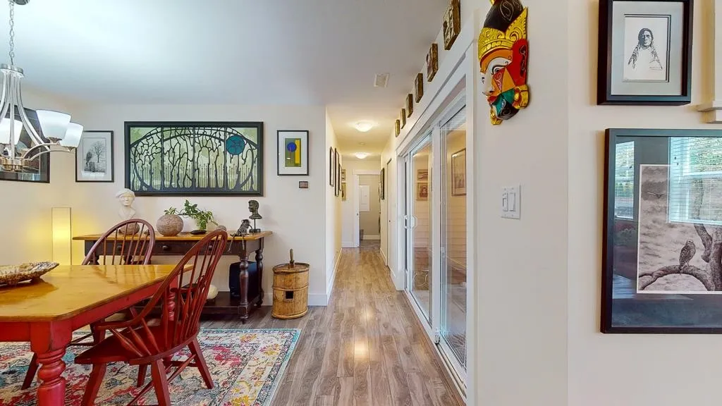 Hallway to covered Sundeck & Bedrooms