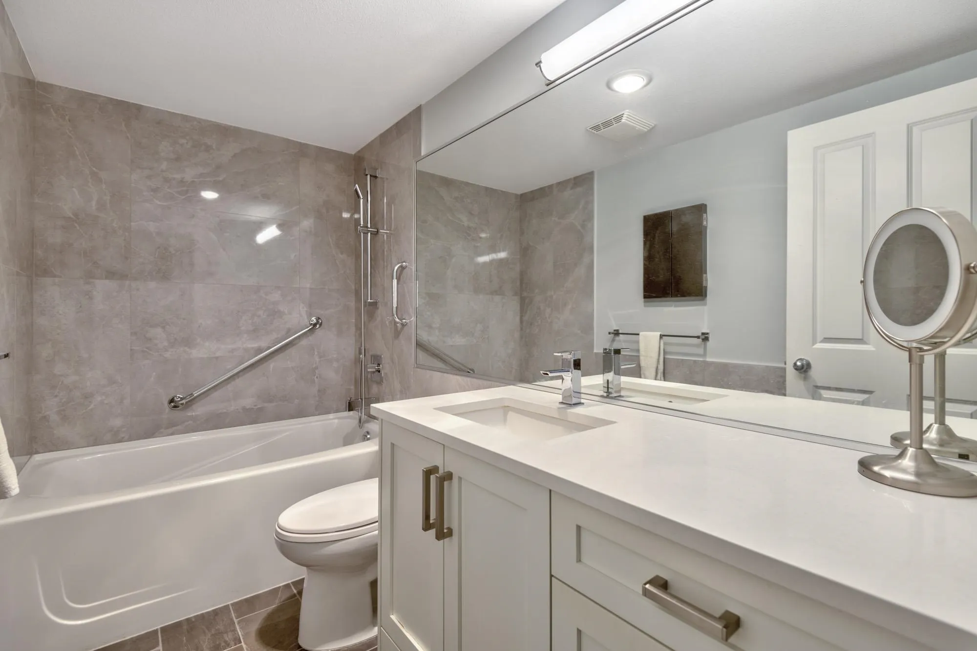 Renovated Ensuite Bathroom off of the Primary Bedroom