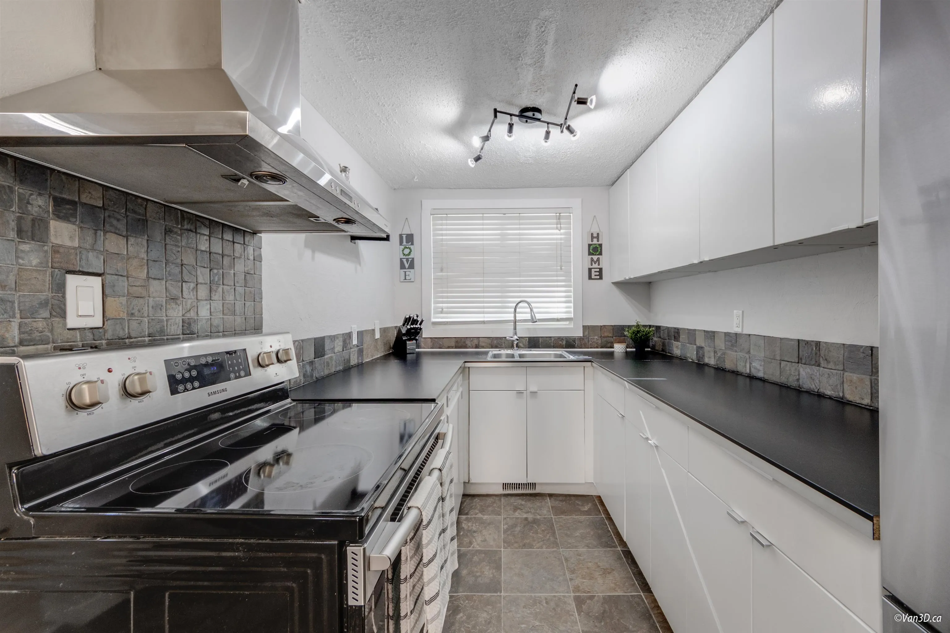 Kitchen overlooks front yard