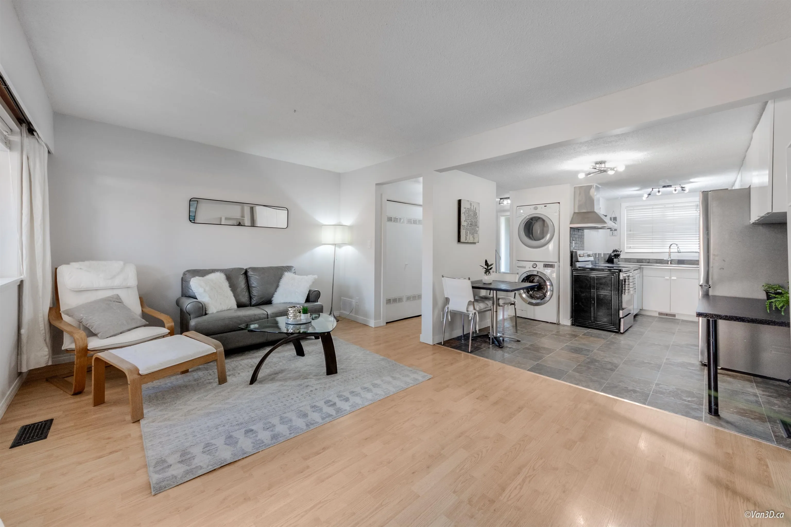 Living room opens up to kitchen