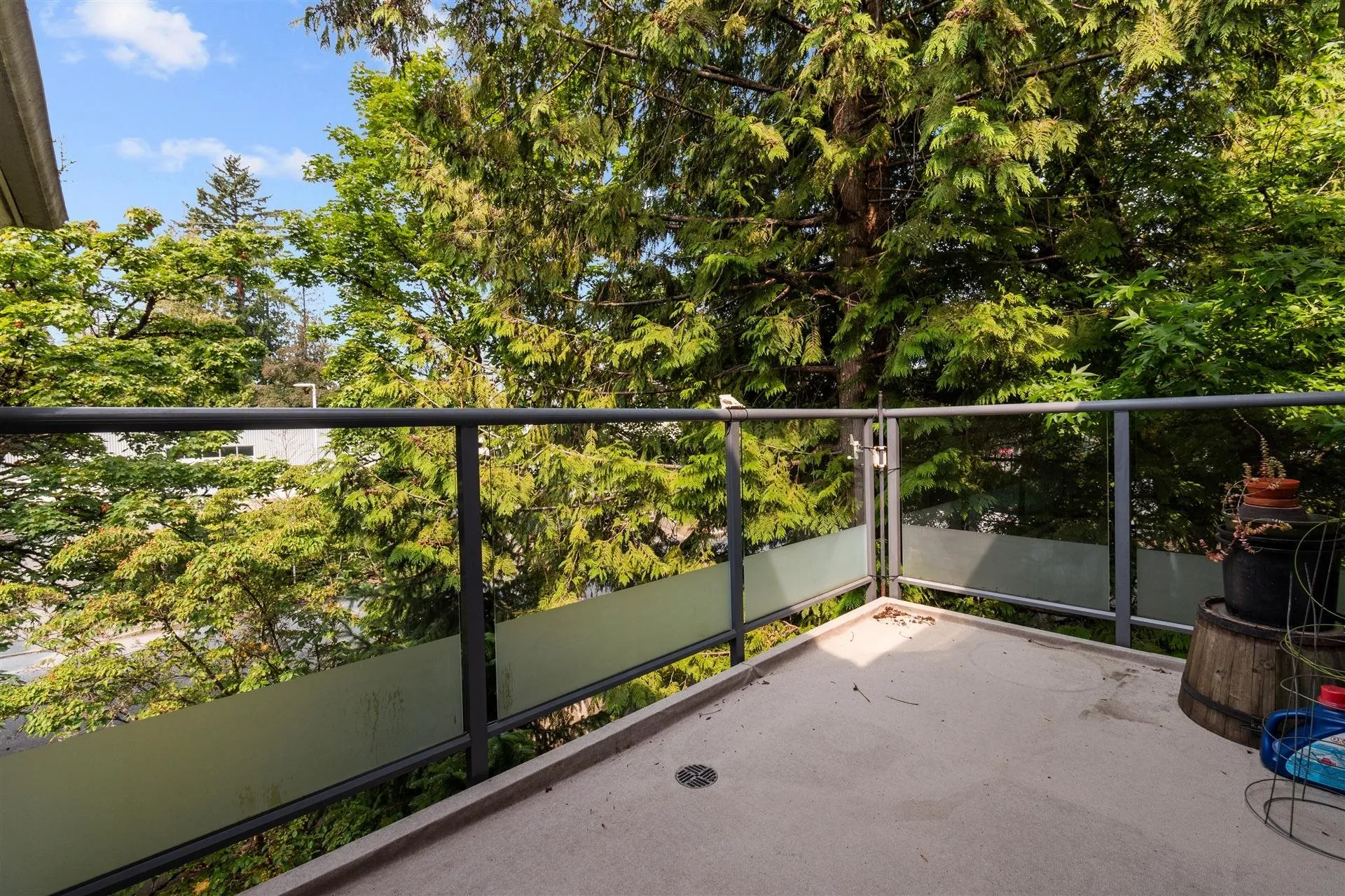 Sunny second patio upstairs with access from bedroom