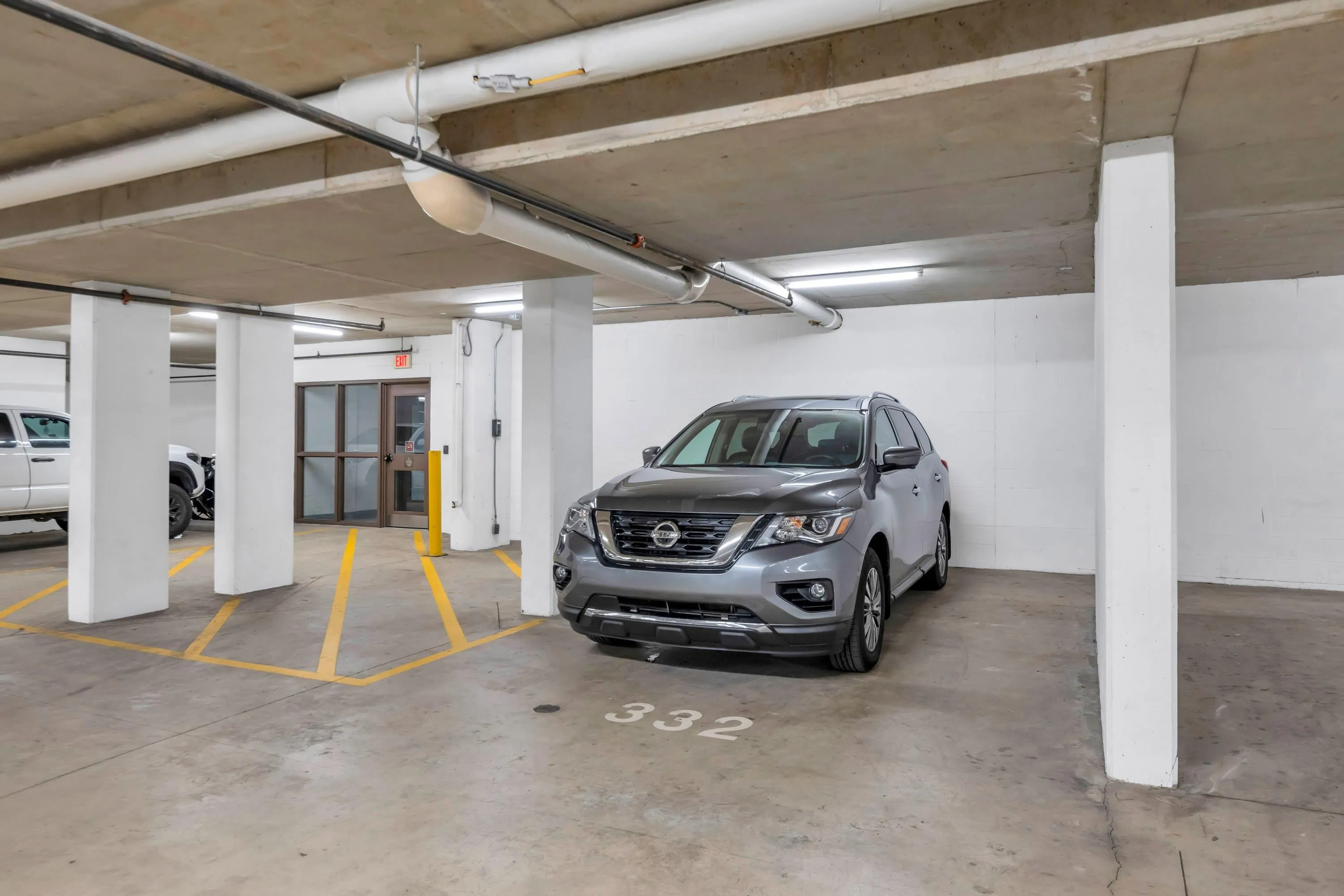 One of two parking spots, this stall is extra large and conveniently located close to the elevator.