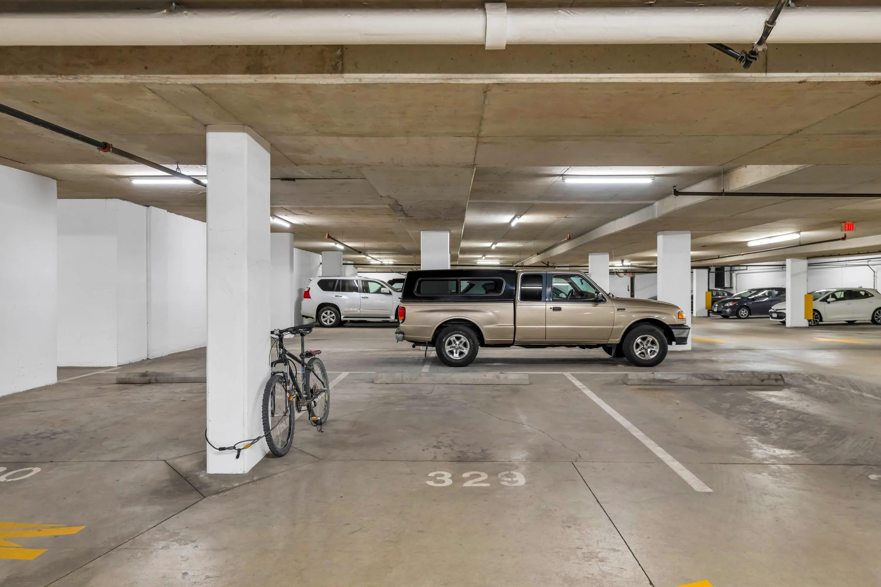 The second of two parking stalls with plenty of room to store your bike.