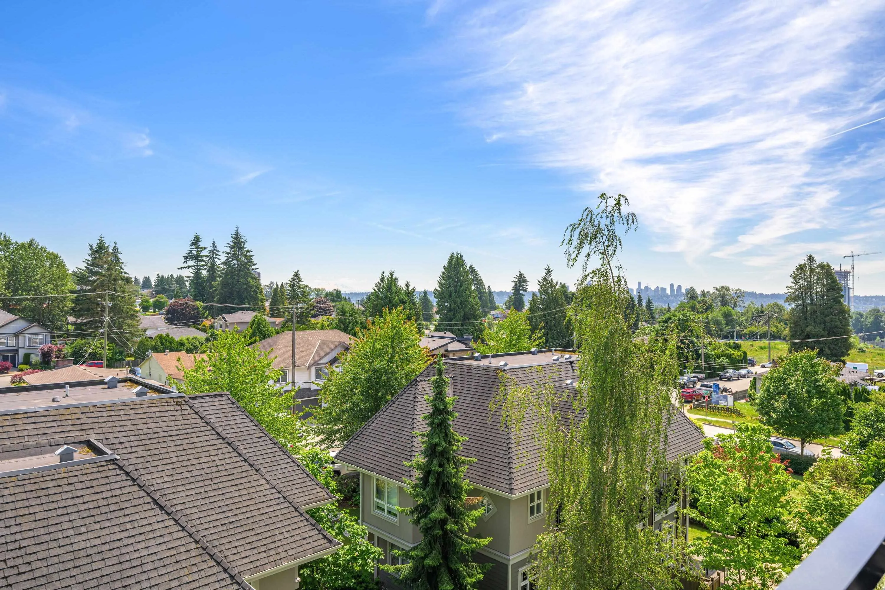 This North East facing unit offers morning sunrises and views of Mount Baker and beyond. No towering buildings just blues sky for miles!