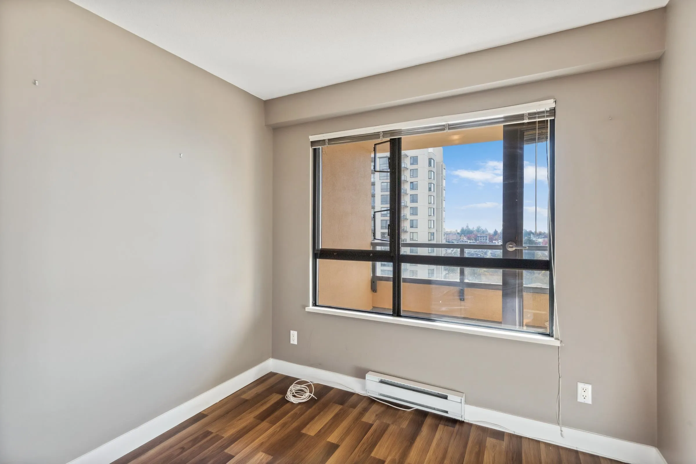 Bedroom #3 overlooks the balcony outside!