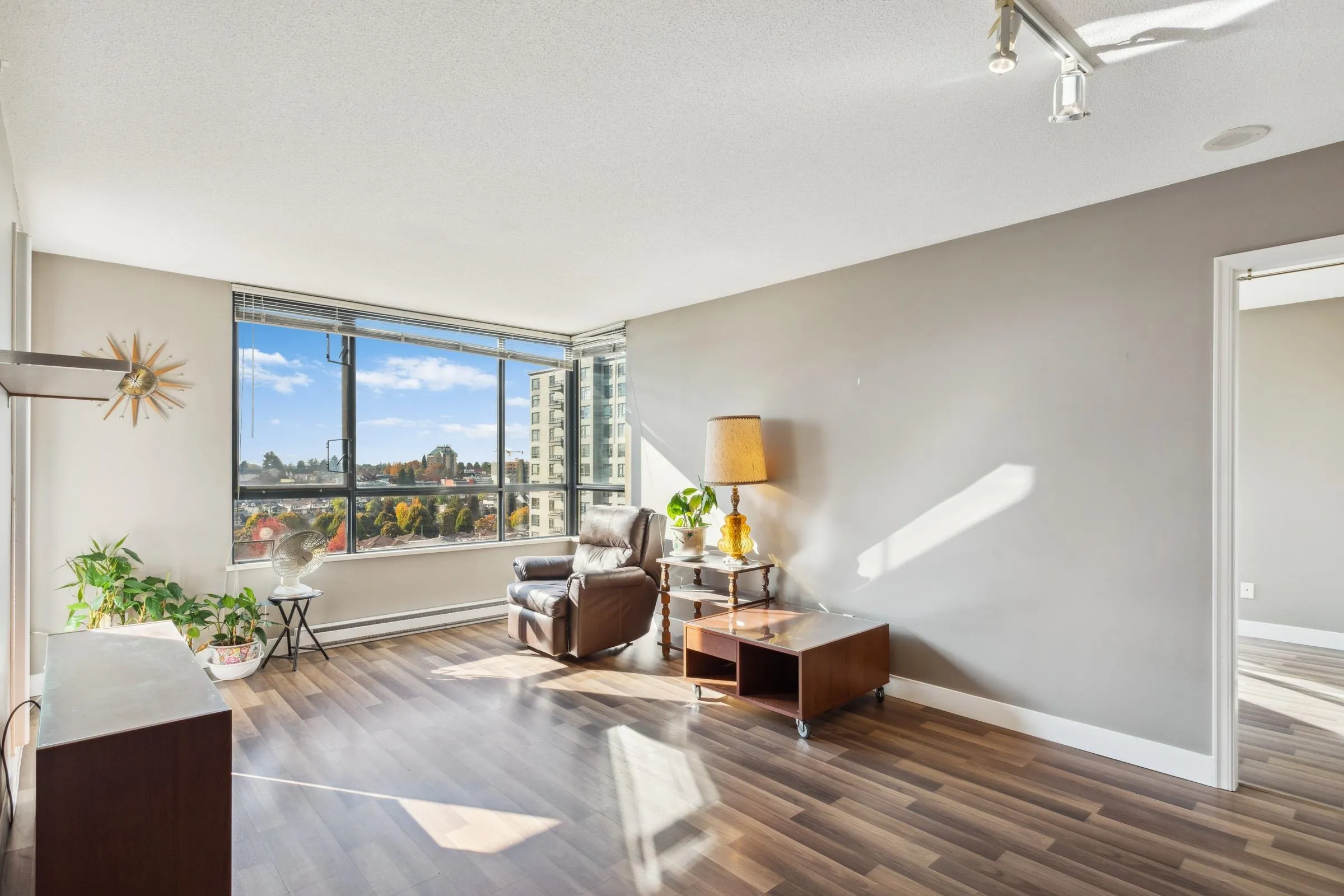 Living Room with southwest corner windows! Lots of natural light!