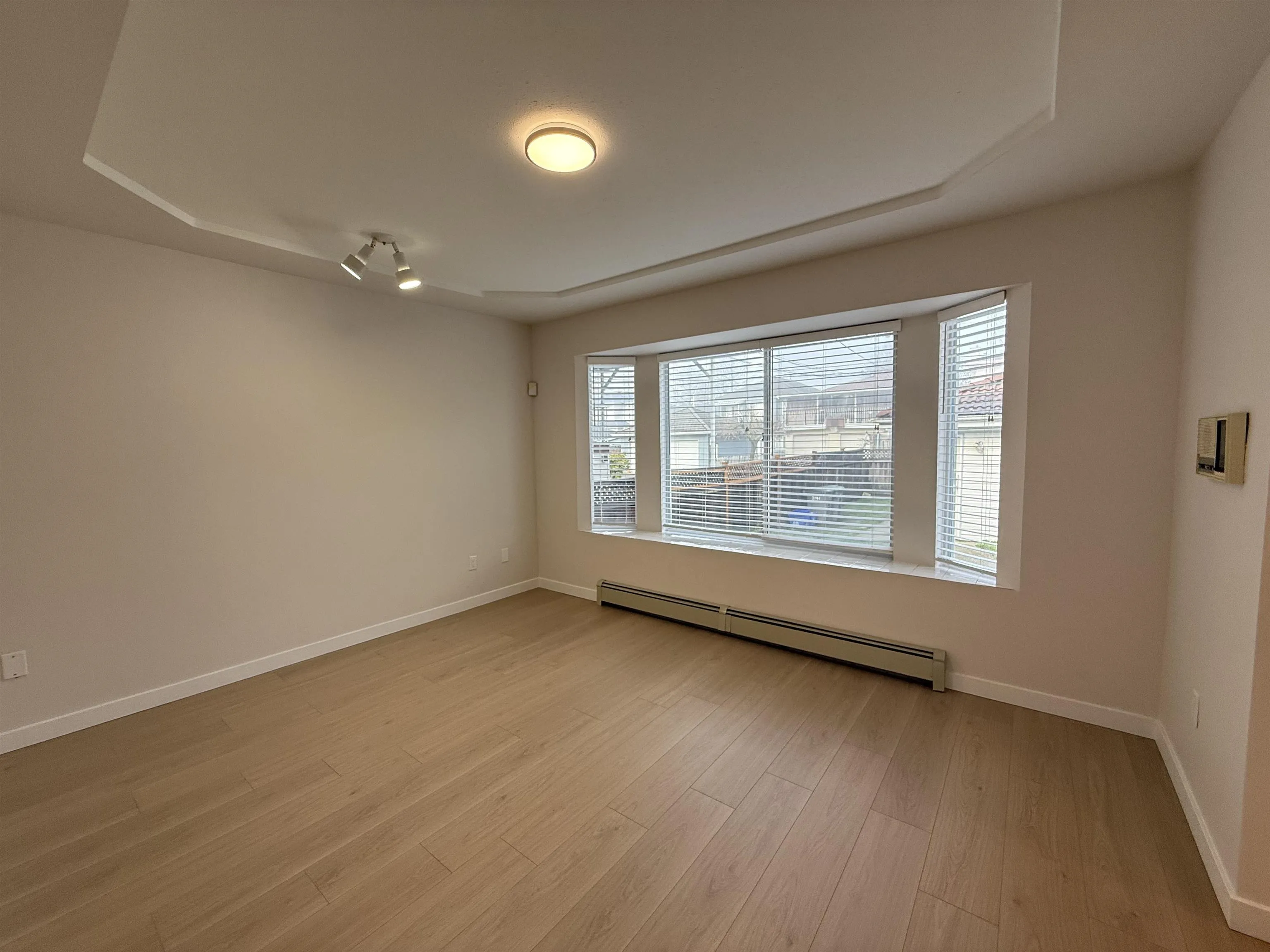 Family room with large windows.