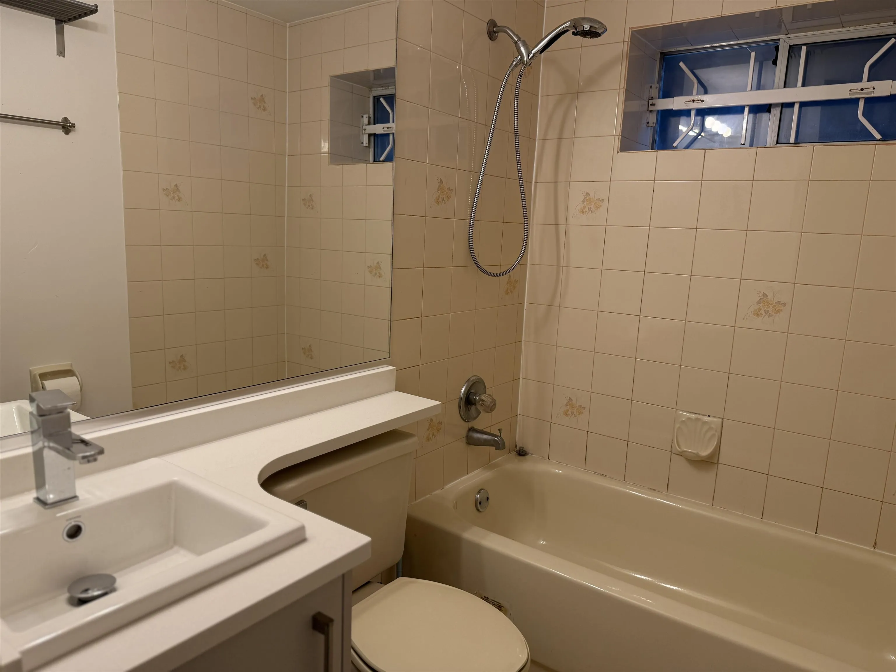 Basement bathroom with new cabinet, new faucet, new basin and new toilet.