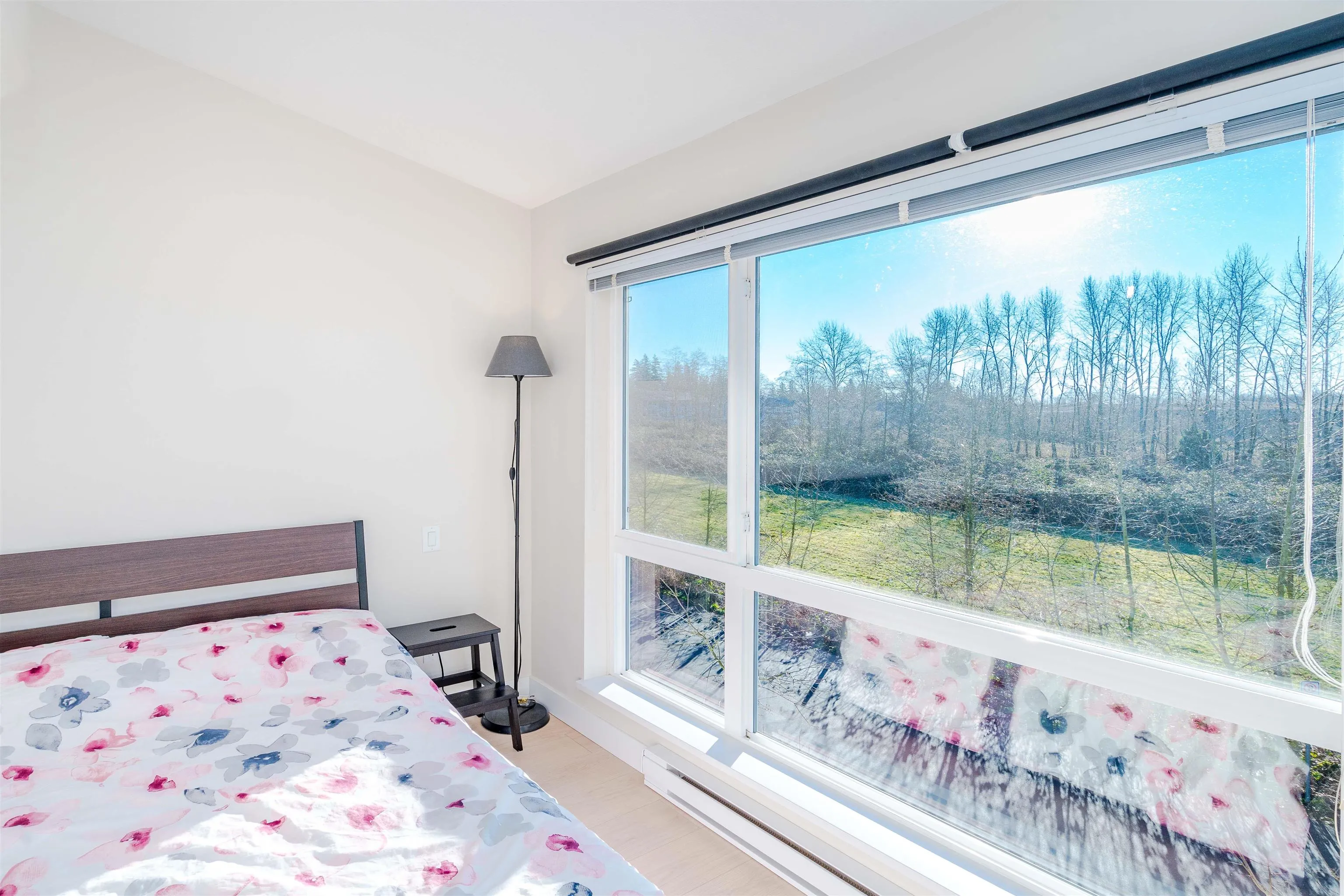 View to greenspace from primary bedroom